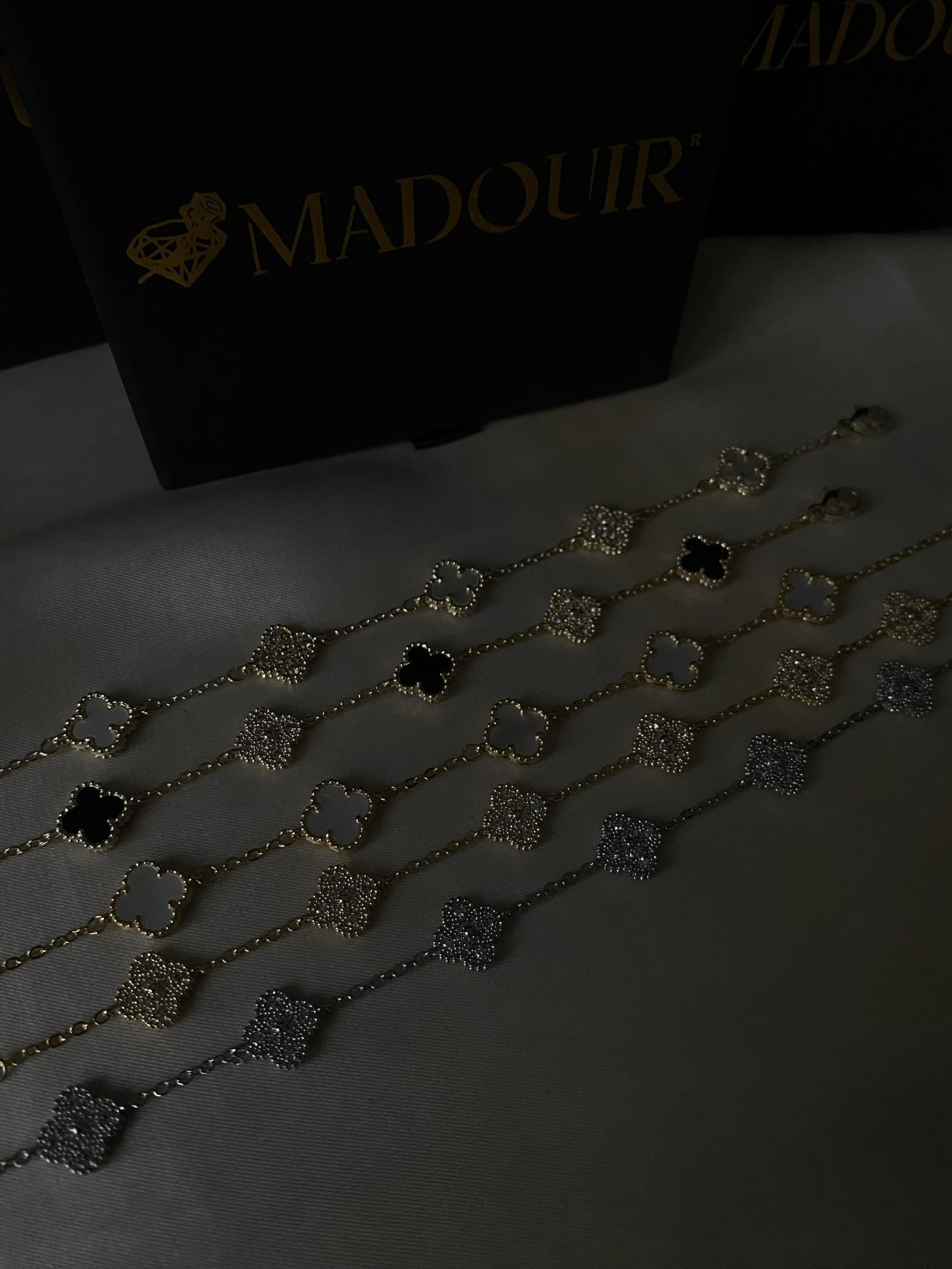 Rojin Bracelets Gold and silver bracelet with clover charms in various colors